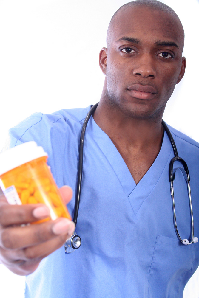 Post a Picture - Page 3 Male-nurse-giving-pills-793542