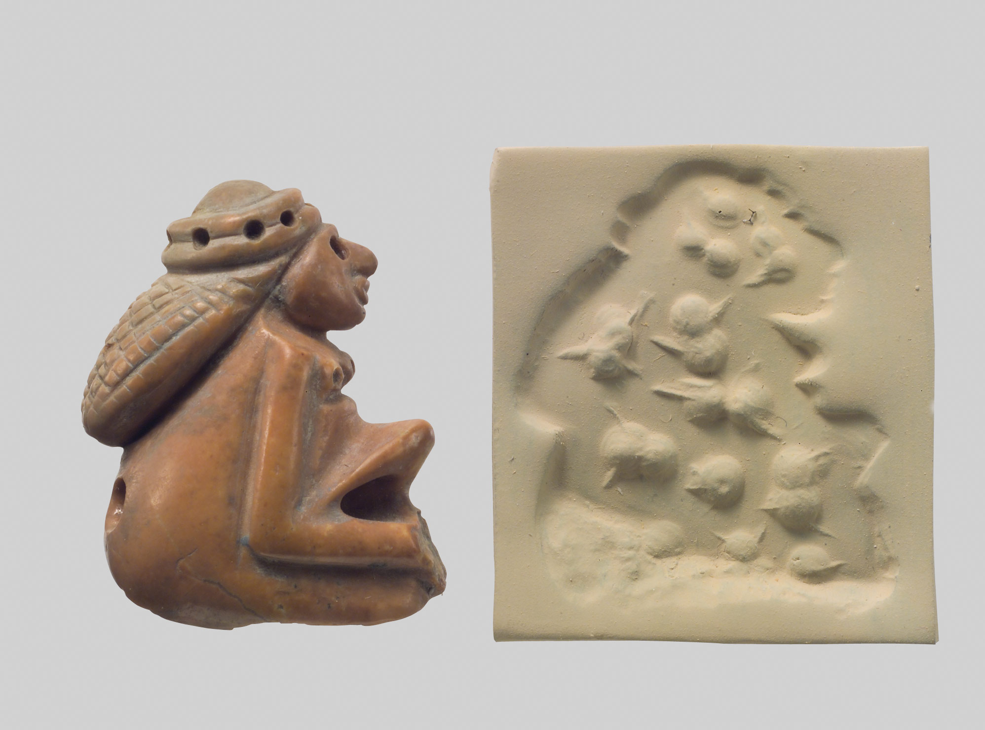Stamp seal amulet of a seated woman Hb_1988.380.1
