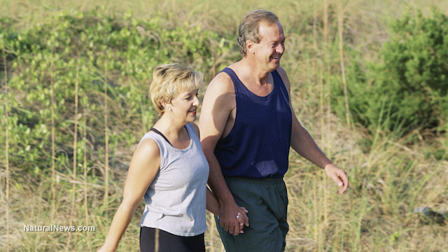 The activity of walking now called the 'superfood' of fitness Couple-Walking-Fitness-Outside