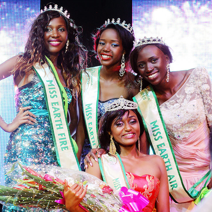 2015 | ME | Uganda | Pearl Assasira Brenda Janat-Muzito-the-third-runners-up-Hope-Jagwer-second-runners-up-and-first-runners-up-Sandra-Akello---posing-with-Miss-Earth-overall-winner-Pearl-Asasira-seated