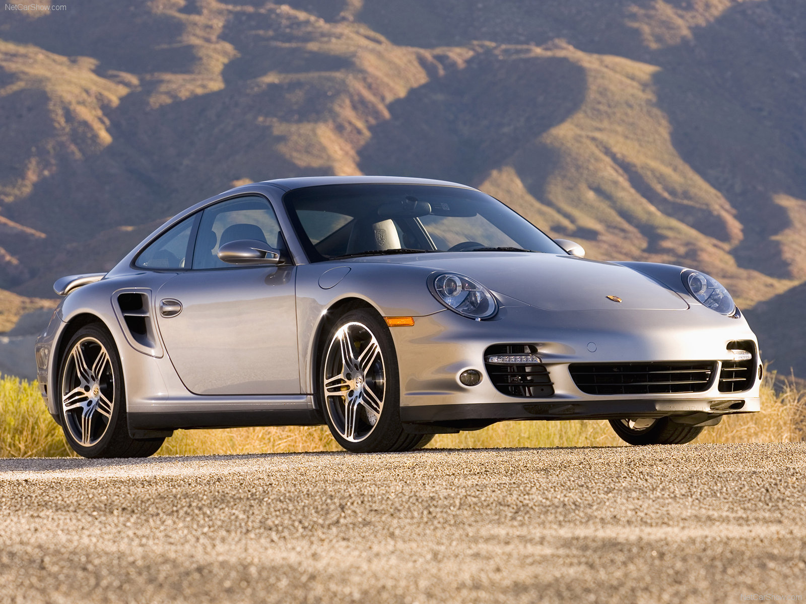 U ovom automobilu bih se rado provozao/la 2007-Silver-Porsche-911-Turbo_Wallpaper_003