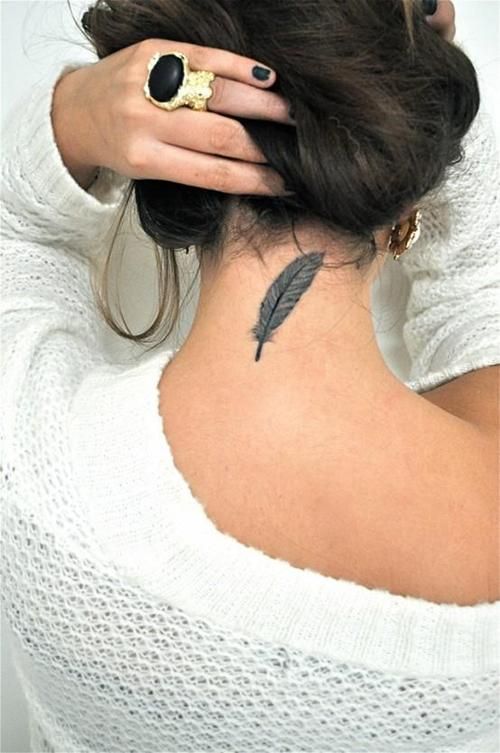 Dionna  Feather-Tattoo-on-Neck