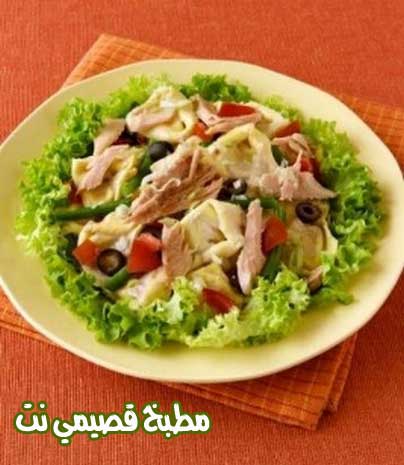 سلطة السمك بصلصة البندورة 080914181634fish140908a1