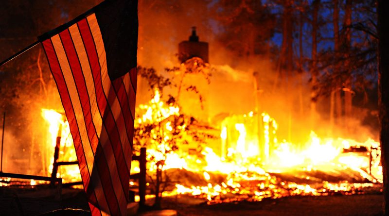 As Hurricanes Slam the South, the Western US Is Literally on Fire  1280px-A_U.S._flag_hangs_in_front_of_a_burning_structure_in_Black_Forest_Colo._June_12_2013_130612-F-CD000-031-800x445