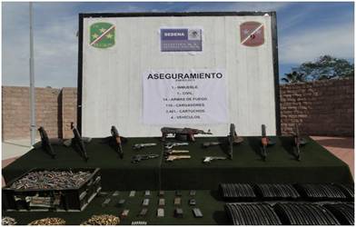 Aseguran un domicilo con Armamento municion vehiculos y equpo tactico en Sinaloa. COM._9a._Z.M._5_ENE._11_1