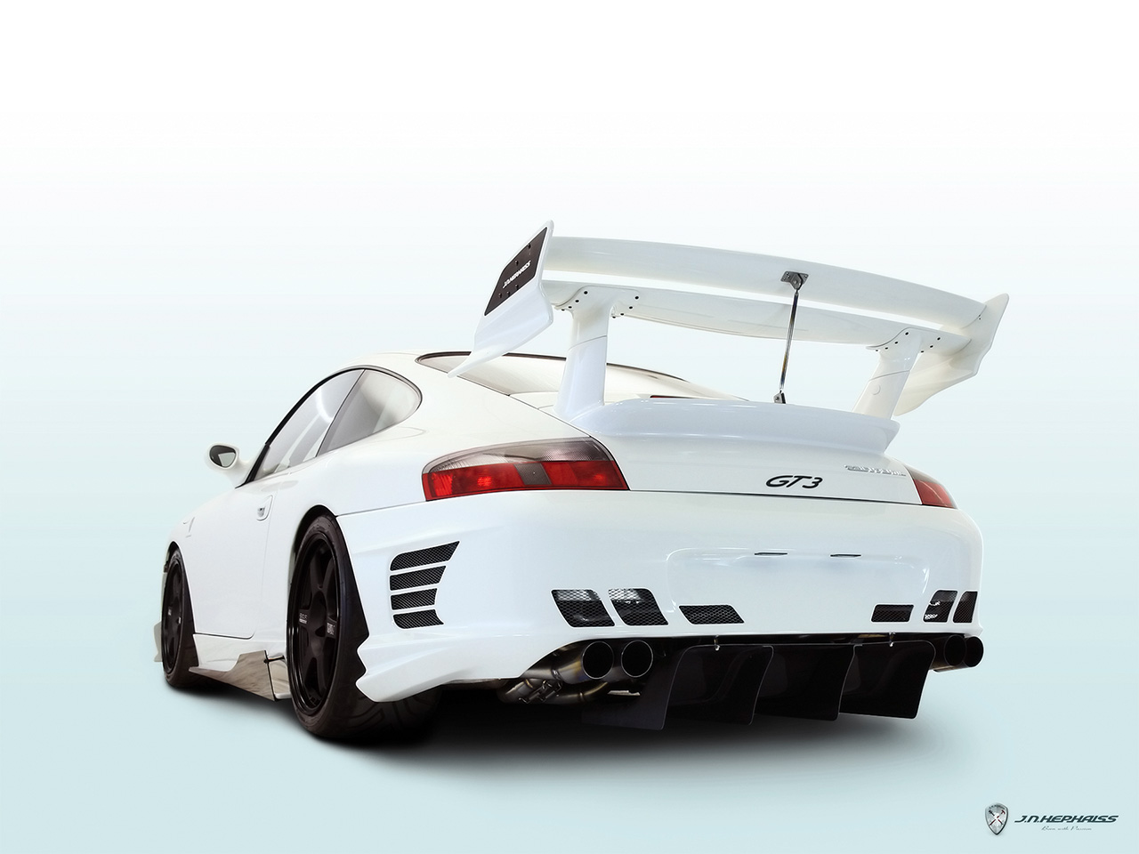 Topic des caisses !!! - Page 11 2006-JNH-Porsche-GT3-996-Rear-Angle-1280x960