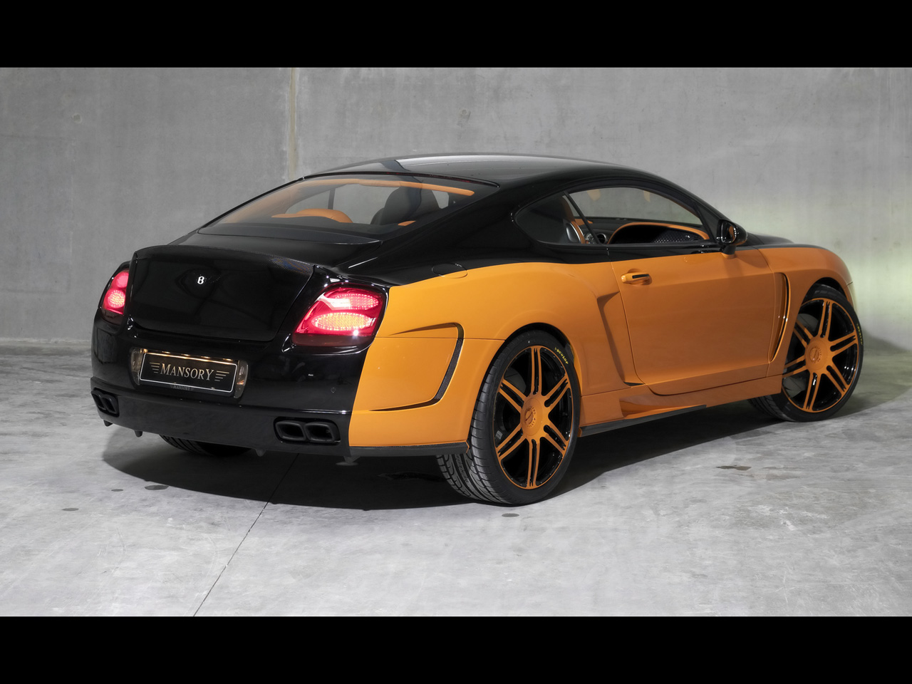     2008-Le-Mansory-Bentley-Continental-GT-Black-And-Orange-Rear-And-Side-1280x960