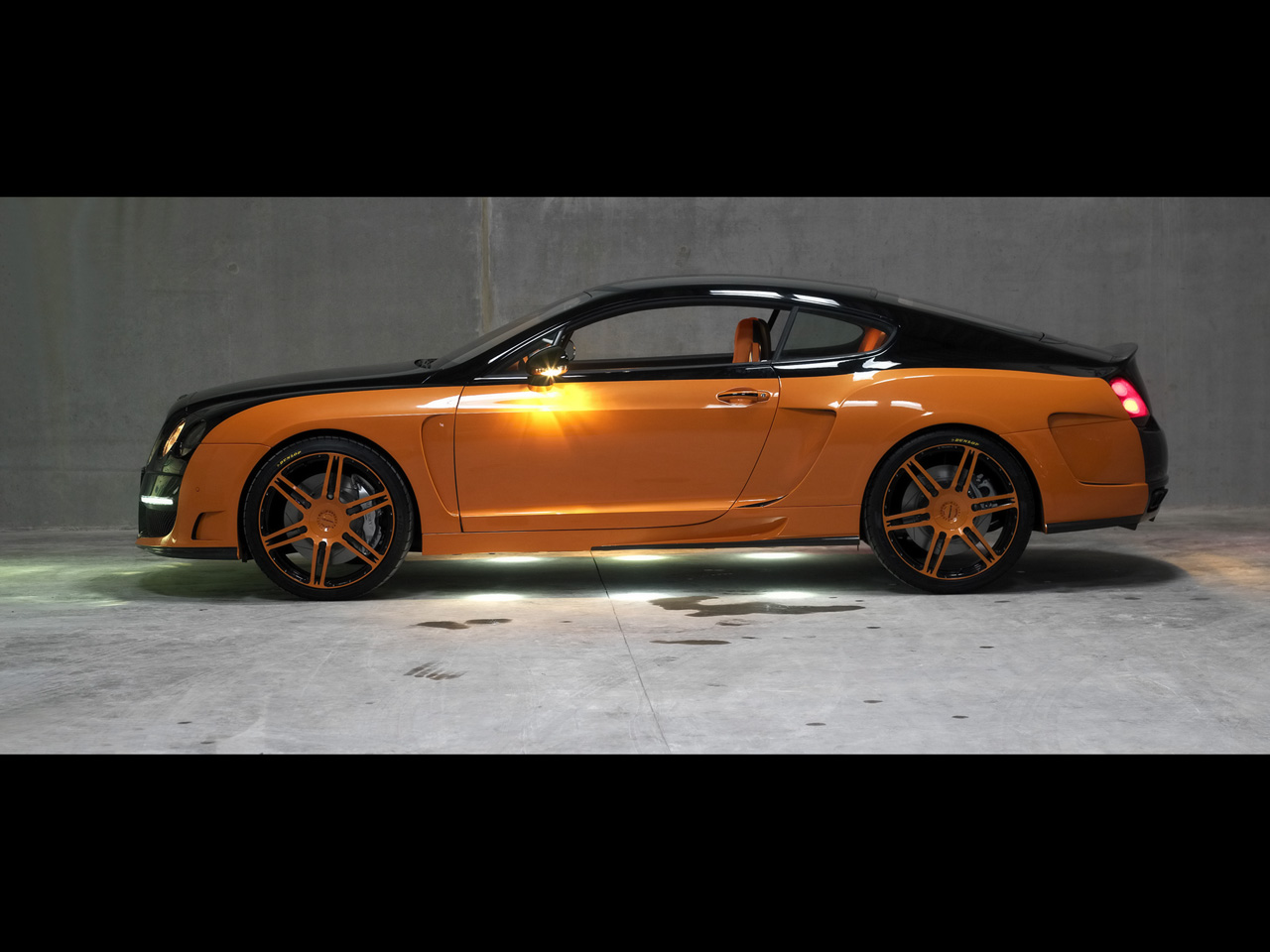 تقرير بالصور عن الوحش القادم (بنتلي 2010) 2008-Le-Mansory-Bentley-Continental-GT-Black-And-Orange-Side-1280x960