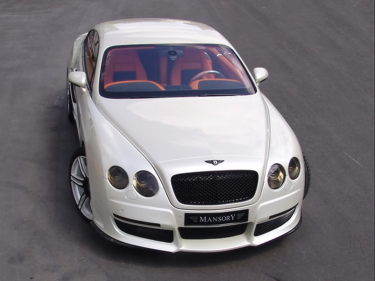 تقرير بالصور عن الوحش القادم (بنتلي 2010) 2008-Le-Mansory-Bentley-Continental-GT-Pearl-White-Front-Angle-Top-1280x960