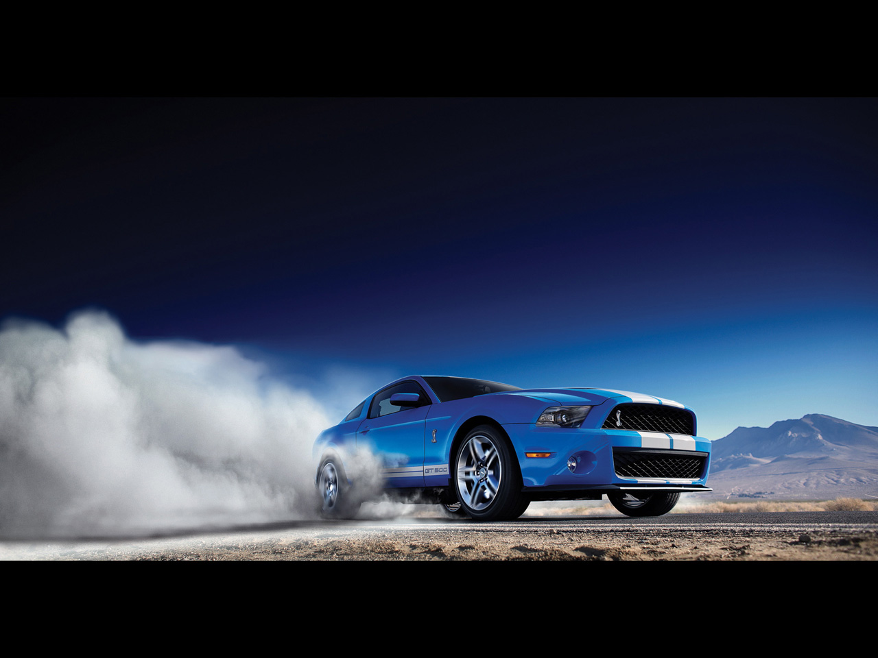  2012 Ford Shelby GT500  2012-Ford-Shelby-GT500-Front-Angle-Smoke-2-1280x960
