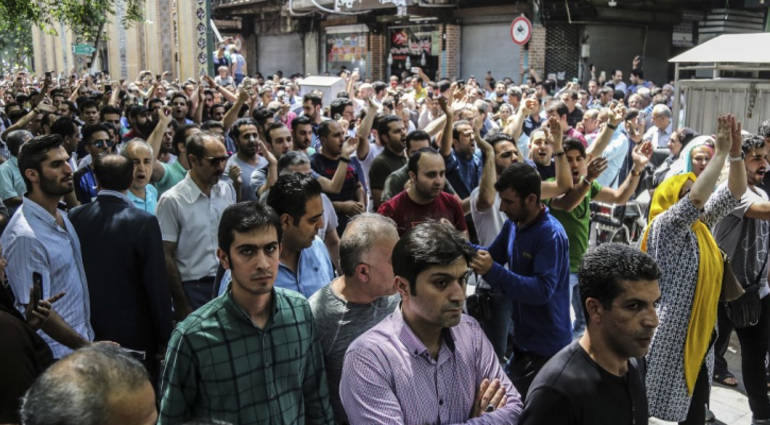 Iranian traders "close" hundreds of shops in Tehran .. Khamenei calls to address the security guards 20180629_110505-499