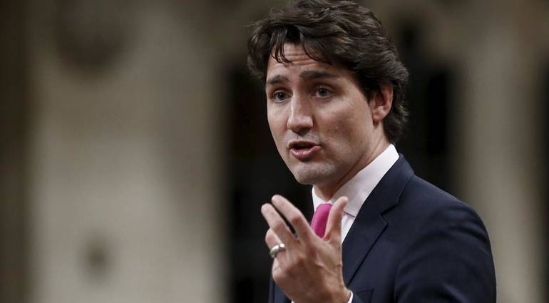 The first scandal of the handsome president .. Trudeau accused of sexual harassment of a female jour 20180707_013359-688