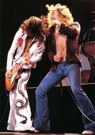 Partagez vos photos hippies-60s-70s! Led_Zeppelin_on_stage_1977