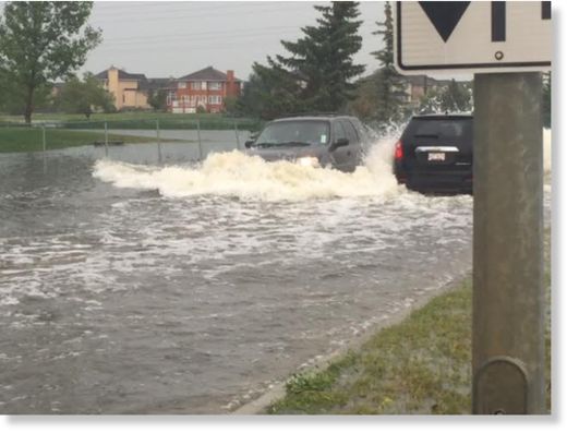 Orage provoque des pannes de courant, des inondations à Calgary, Canada  Chestermere_flooding