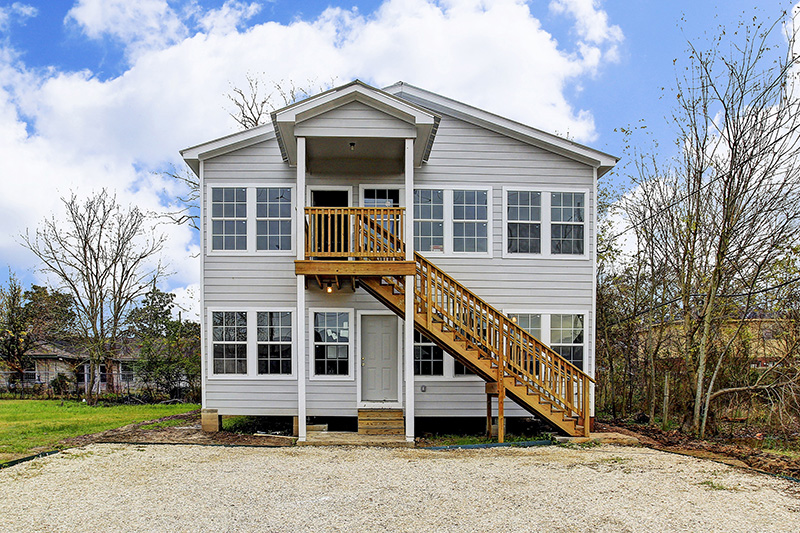 He Bought 4 Shipping Containers And Stacked Them. Take A Look At The Finished Home! Otamf-07-Front-Finished