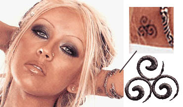  Christina Aguilera >> preparando nuevo álbum [III] - Página 21 Christina_aguilera_sacred_scroll_tattoo