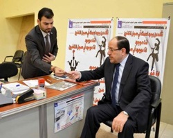 Maliki, "I came to receive my electronic election to ensure my participation in elections." 338860897