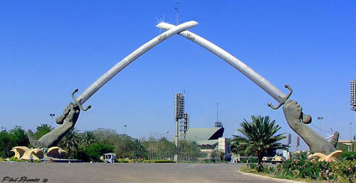 رحيمي و68 شركة أيرانية للتدخل الإيراني في العراق .. مخطط خطير جدا Monumental_gates_saber_stadium_baghdad_iraq_photo_iraq-ir