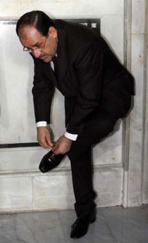 صور لرئيس الوزراء نوري المالكي تخبل AlmalikiChoosthirdpower
