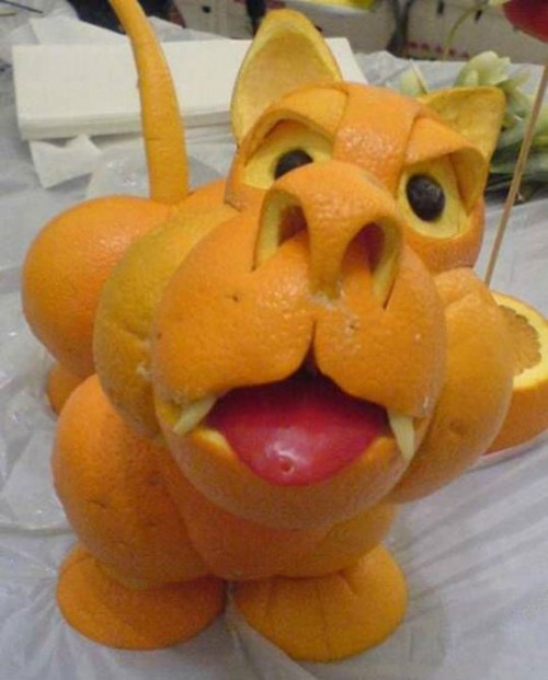 Como pelar naranjas y mandarinas con ARTE xD!! Formas-de-pelar-una-naranja-con-arte-02-e1269591490328