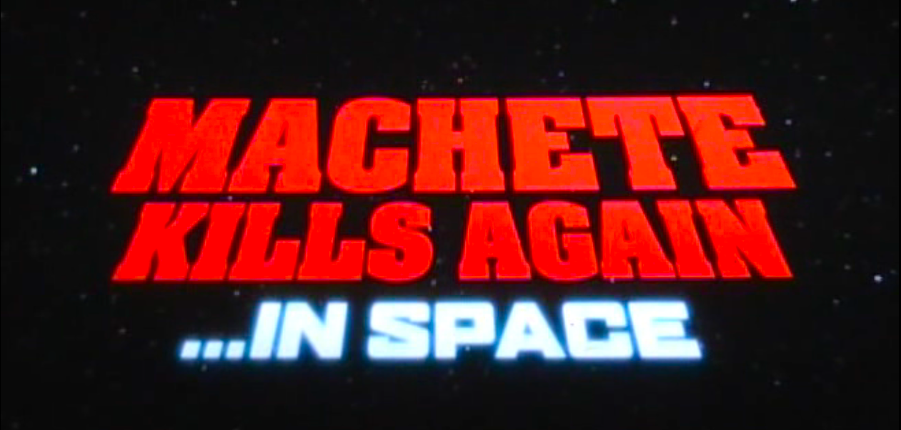Cinema e scene dei film - Pagina 2 MACHETE-KILLS-AGAIN_IN-SPACE_LOGO