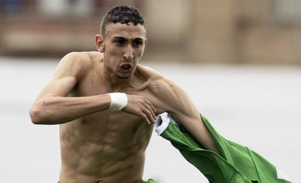 اشبال الجزائر 02-11495-algeria-s-bendahmane-nadir-celebrates-the-team-s-goal-against-burkina-faso