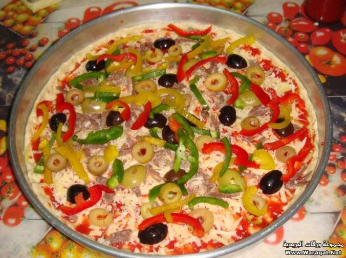 بيتزا على الطريقة الايطالية .. لذيذة وسهلة‎ Pizza_itale12