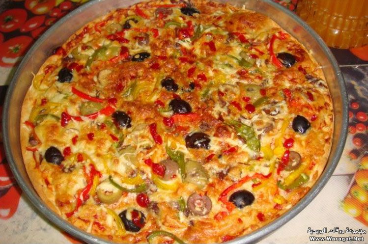 بيتزا على الطريقة الايطالية .. لذيذة وسهلة‎ Pizza_itale14