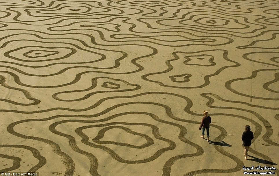 الرسم على رمال الشواطئ Sand-art4