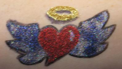 Free hand glitter tattoos? Glitter%20tattoo%20heart%20wings