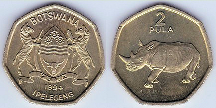 Rinocerontes en monedas y billetes 26-25