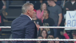 Ahí viene el dinero 1456976144-the-wwe-universe-erupts-as-shane-mcmahon-re-emerges-on-monday-night-raw-raw-february-23-2016-5
