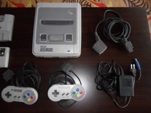 [ESTIM] Console Megadrive/SNES/GBA en boite + jeux ! Mini_625769SAM0449