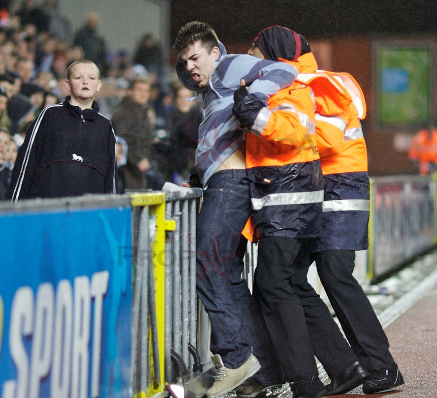 Season 06/07 - March - Page 5 585645BlackburnRoversfanfrominvadingthepitchagainstWestHamUnited03032007