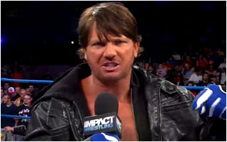 ATTITUDE  - AJ STYLES VS. MANDREWS 933436AJ14