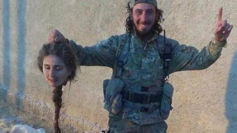 kurdish woman has been beheaded by the islamic state in kobani, syria