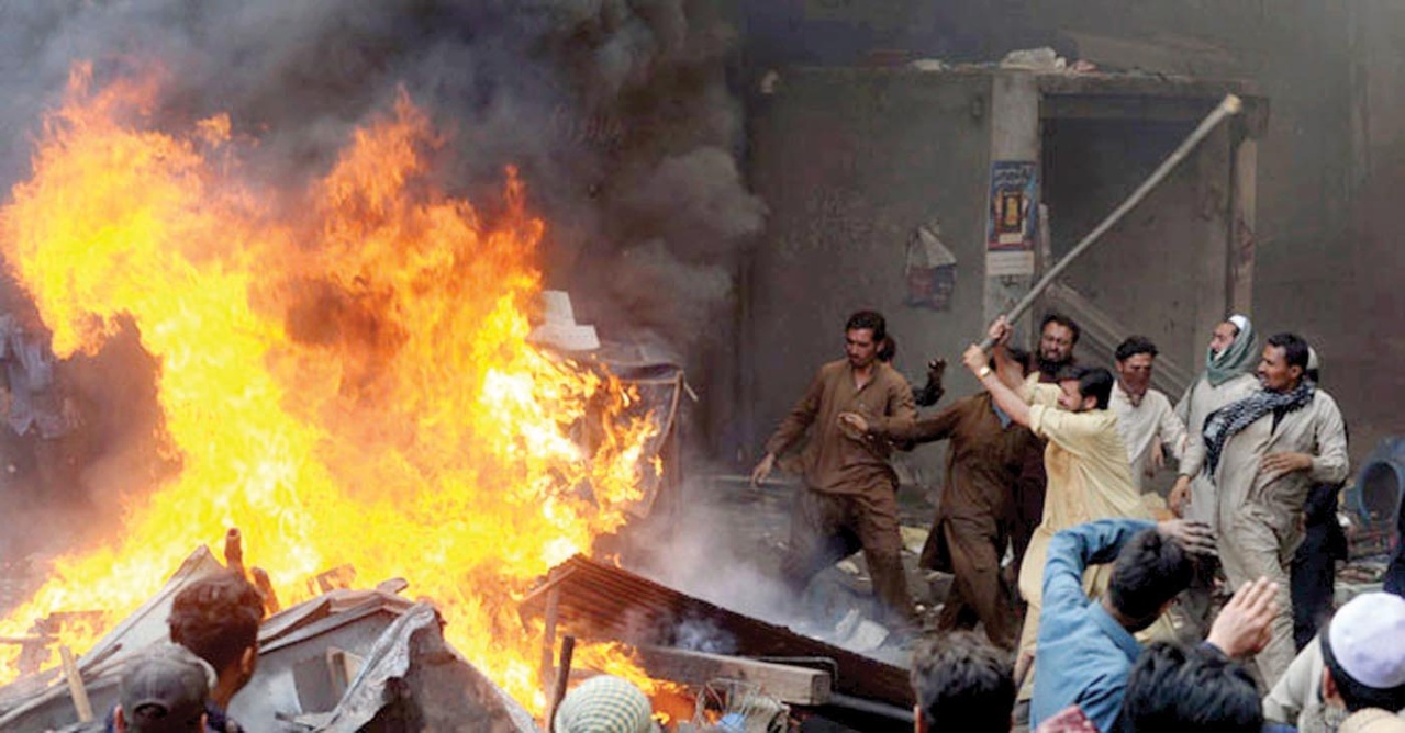 muslims attack ahmadis living in colony of gujrawala arafat in pakistan and burn their homes (2014-7-27) the mob violence was sparked by blasphemous post on facebook