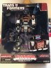 A planned redeco of Titanium Soundwave in his black and red Soundblaster colors, this toy would have come with a new Titanium version of Ravage instead of Laserbeak.