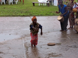 little liberian boy perfoming traditonal dances