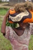 Liberian "Gola" girl carrying greens to market