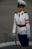 Picture of a Traffic Lady taken perhaps by a passenger on a passing bus.