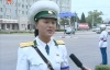 A PTG is interviewed about the new podiums in a Chinese news segment - the podium in the background.