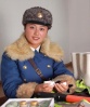 A traffic lady shows off some of the cosmetics that are provided to all the traffic women by the state.