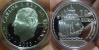 Acabado Proof. Premio Coty (Coin of the year de Krause) a la Mejor moneda de Plata del mundo emitida durante el año 2003.