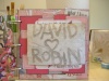 My (then boyfriend, now husband) wrote 'david loves robin' in the concrete as he poured the foundation for a building we affectionately call 'the annex' on our property. (We lived in a camper for 1 1/2 years while we had our house put in-eventually he built the annex to store things on level 1, and make us a real bedroom on level2). This is a close-up of our message. Love this! TFL!