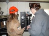 Computerwhiz shows Kris how to use the coffee grinder at the new Bird Feeder in Big Stone City.