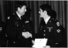 SP5 Brown receiving award from Brigadier General Woodard, 
Commander, Letterman Army Medical Center