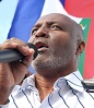 Rev. Gerard Jean-Juste politically influential Roman Catholic priest. Jean-Juste has remained active in Haitian politics despite the charges against him, leading thousands in an April rally for Aristide's return at an amphitheater in the Oceanside slum of Cite Soleil.